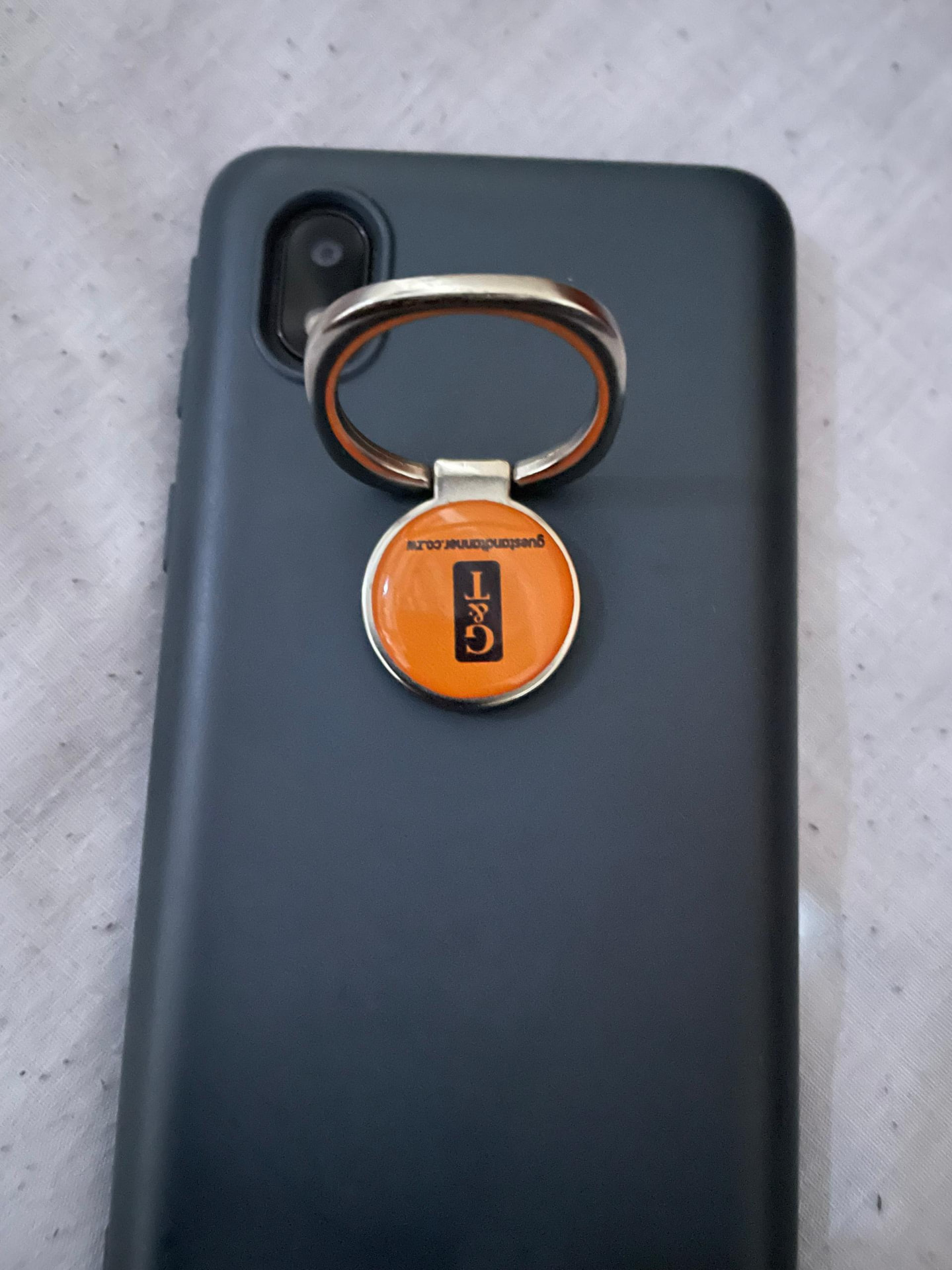 Branded phone ring holder